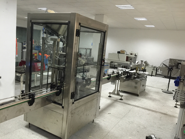 ეტიკეტირების მანქანა საფარის ხაზი.jpg