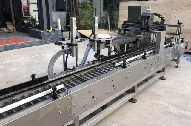 ზეთის შემავსებელი ვედრო გადახურვის მანქანა.jpg