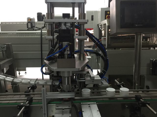 ქილების დალუქვის მანქანა.jpg