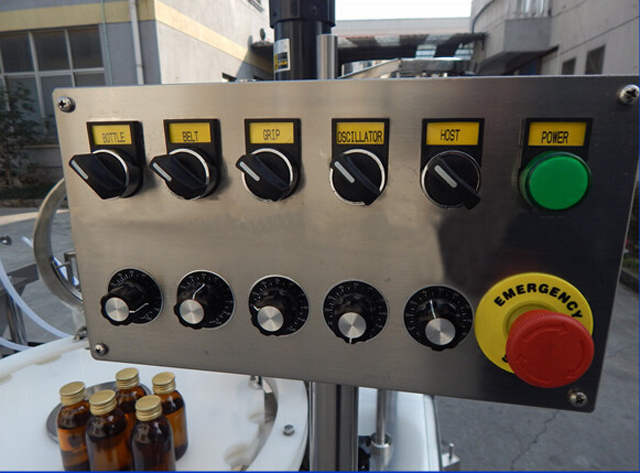 ღილაკი, რომელიც აკონტროლებს დაფარვის მანქანას.jpg