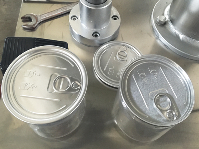 ლითონის ქილების გადახურვის მანქანა.jpg