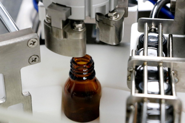 ზეთის ბოთლების შემავსებელი მანქანა tabletop.jpg